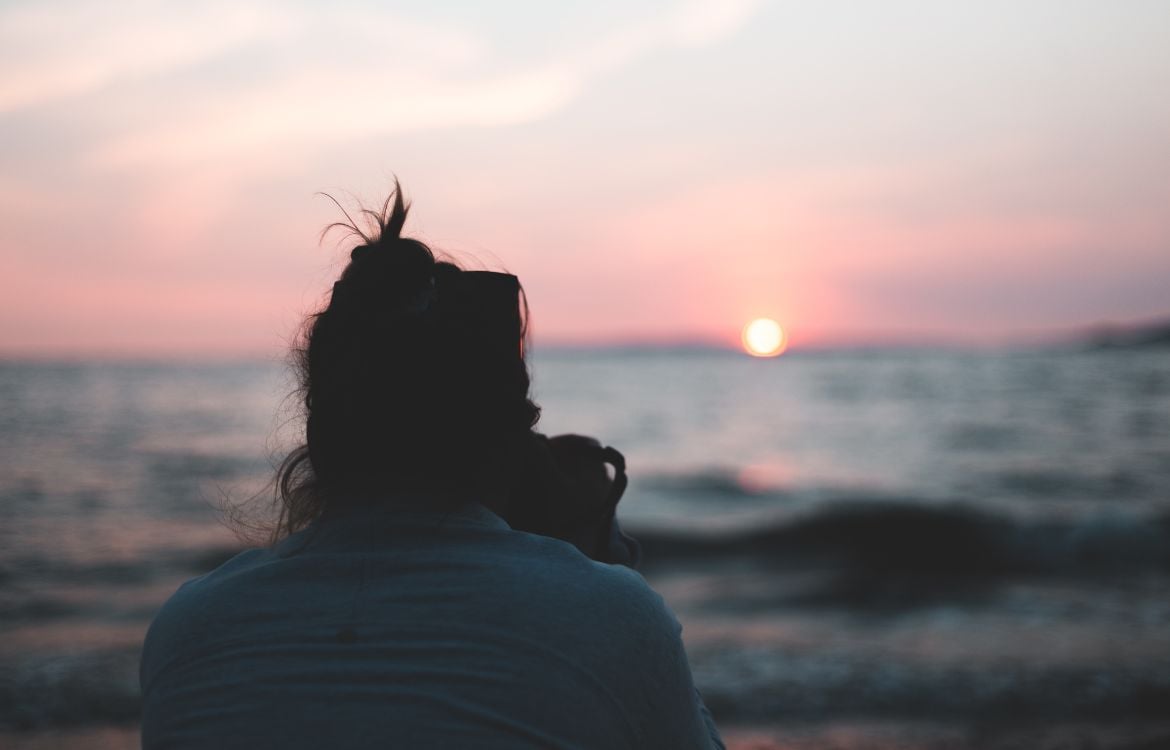 female-looking-out-to-ocean
