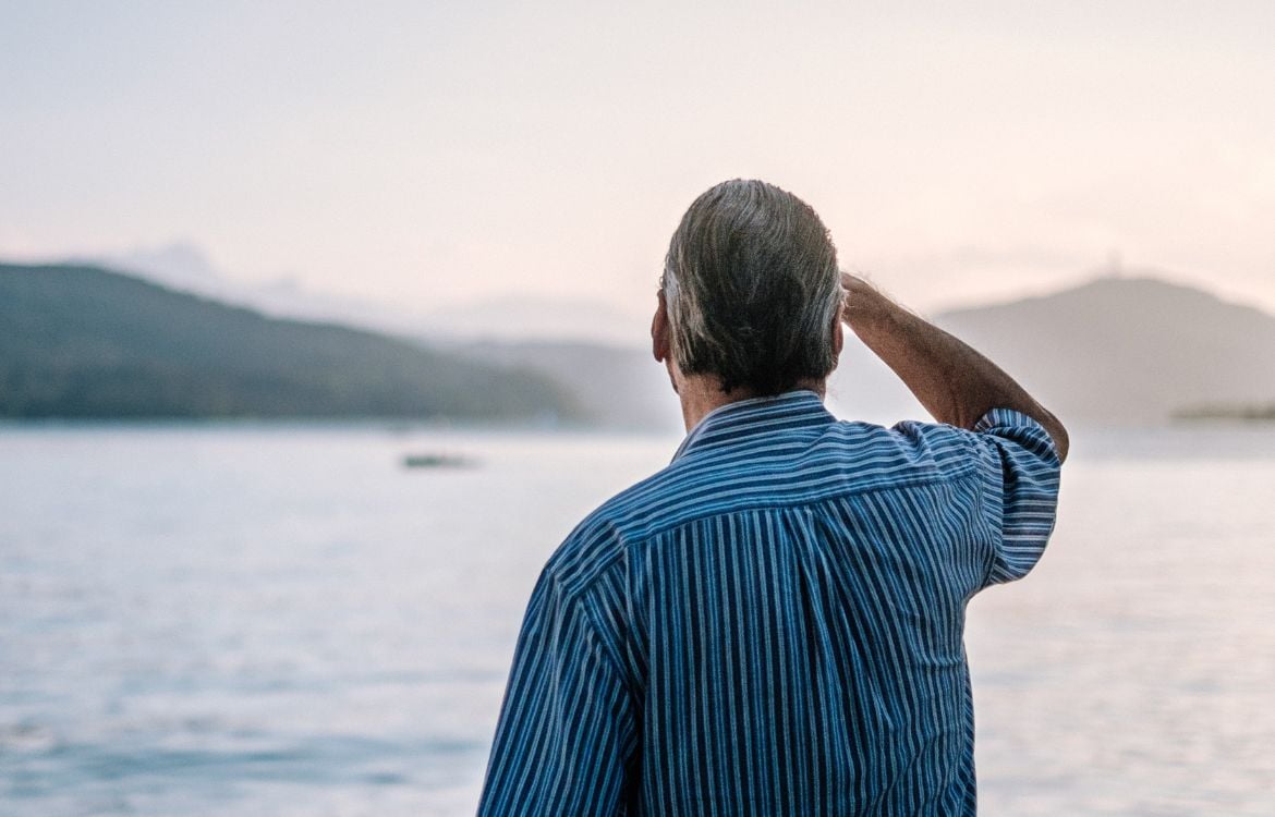 older-man-looking-out-at-ocean