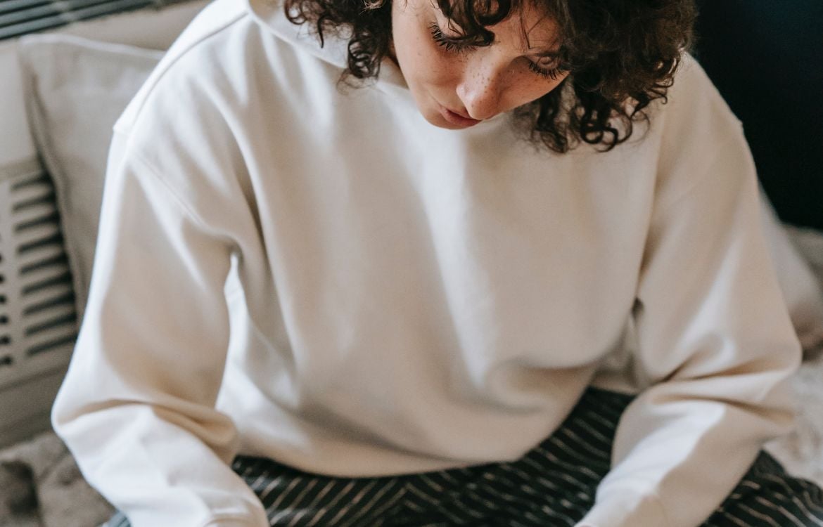 girl-at-home-looking-down