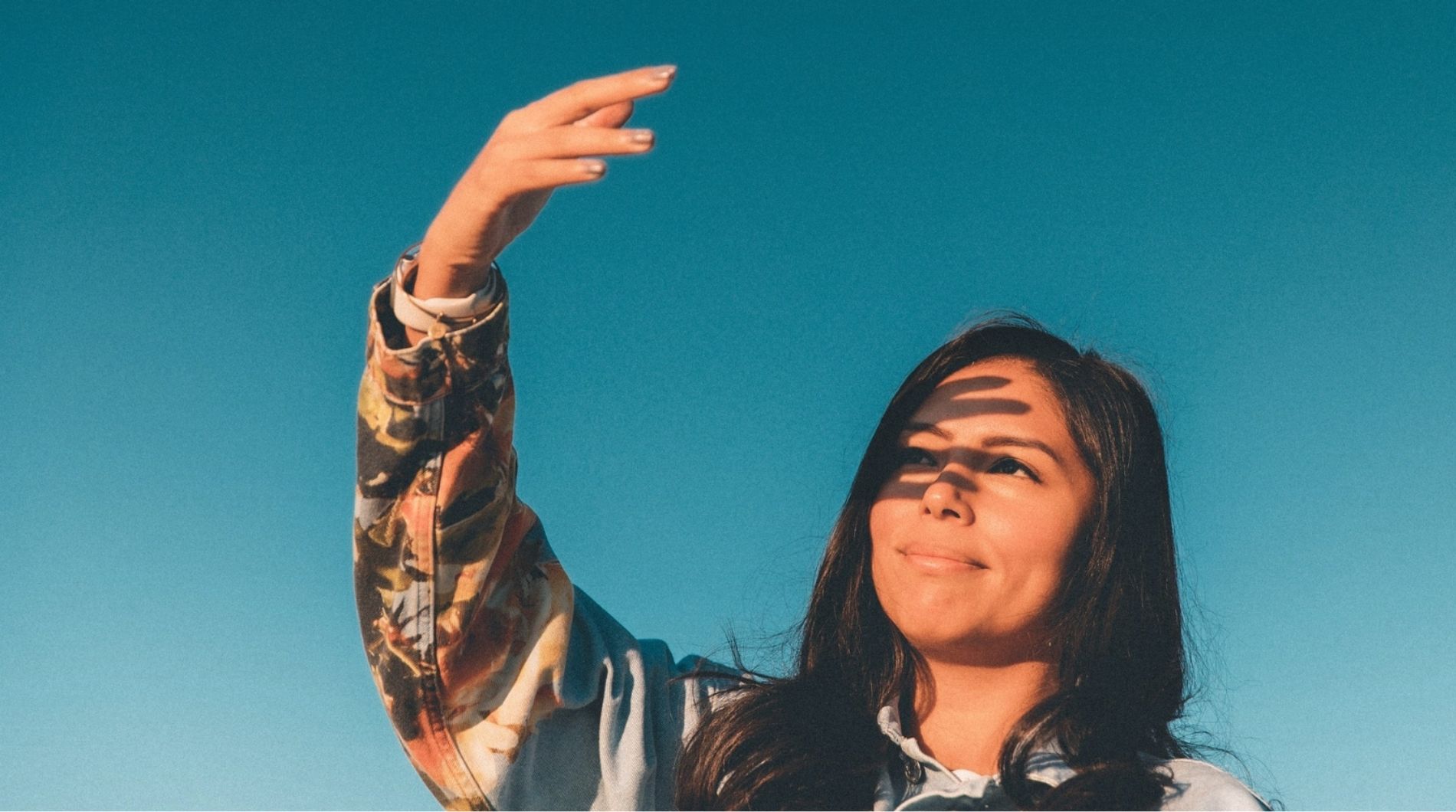 woman-against-blue-sky-hero